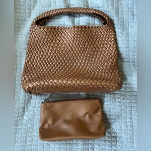 Brand new never used tan woven shoulder bag with interior pouch.